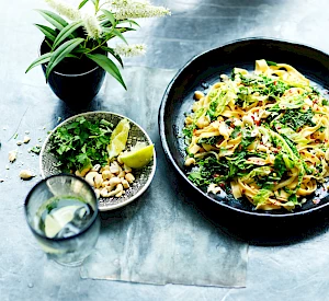 Photograph of Cabbage, celeriac, cashew and chilli noodles. Vietnamese food.