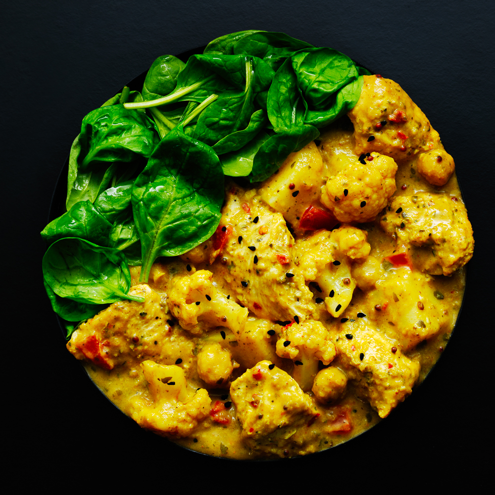 Photograph of a bowl of Keralan Chicken Curry with Spinach