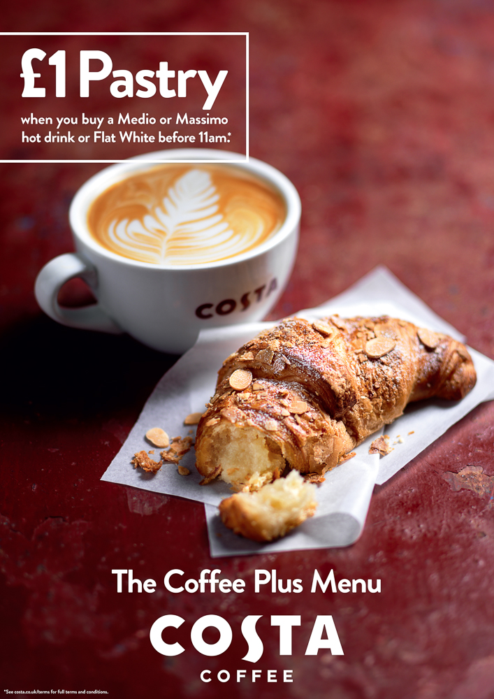 Photograph of a flat white with an almond croissant