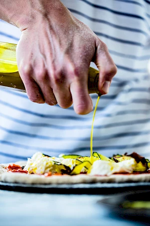 Pizza Making Pouring Oil