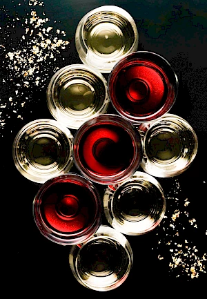 Overhead Close Up of Wine Glasses With White and Red Wine Pattern